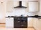 Modern modular kitchen interior, range cooker and chimney hood