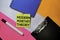 Modern Monetary Theory text on sticky notes with color office desk concept