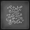 Modern mono line calligraphy lettering of Start your day with a smile in white on chalkboard background with frame