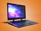 Modern multimedia laptop for work 3d render on orange background