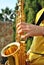 Modern musician posing with his saxophone