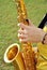 Modern musician posing with his saxophone