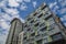 Modern neat beautiful condos blue sky clouds