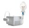 Modern nebulizer with face mask on white background. Inhalation equipment