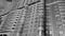 Modern new Apartment Building fragment windows and balconies in black and white monochrome photo