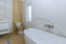 Modern new bathroom interior with bath tub and toilet seat