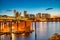 Modern night skyline of Portland with river light reflections, O