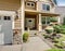 Modern northwest home with tan exterior, and garage.