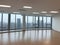 modern office boardroom and meeting room interior with desks, chairs and cityscape view.