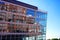 Modern office building at Media Harbor / Medienhafen with Gehry buildings reflecting in the facade.