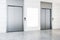 Modern office lobby interior with steel elevators, empty poster, concrete flooring and tile wall. Mock up,