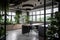 a modern office space with a view of lush greenery and indoor plants