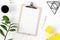 Modern office table desk female workspace clipboard accessories flat lay top view