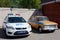 Modern and old cars of the road patrol service of the police.