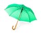 Modern opened green umbrella on white