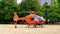 Modern orange paramedic ambulance emergency aircraft Germany on helipad, medical helicopter, Air medical services, Rapid Response