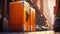 Modern orange suitcases stand in front of the entrance to a business center or exclusive hotel. Close-up of travel luggage.