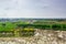 Modern outskirt area with background of residential area and green fields in Ningbo City, Zhejiang, China