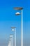 Modern overview of electric public street lampposts in perspective