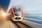 Modern passenger high-speed electric train moving fast along terminal platform. Motion blur