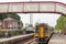 Modern passenger train seen arriving at a North Yorkshire railway station, in the heart of the Dales.