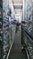 Modern pharmacy storage room With two robot hands that are arranging and storing out drugs in a pharmacy .