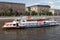 Modern pleasure boat sails along the Moscow River.