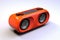 Modern portable speaker on white background. Music loudspeaker or player with wireless technology.