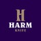 Modern professional logo H harm knife in gold and purple theme