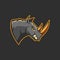 Modern professional logo for sport team. Angry Rhino mascot. Rhinos vector symbol isolated on a dark background.