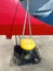 Modern red and gray ship bow. Mooring bollard with heavy duty mooring ropes. Detail of mooring with the rope of the boat in the