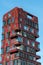 Modern red highrise apartment building