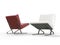 Modern red and white leather armchairs - side view