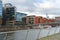 modern residential buildings german european city frankfurt, region canals and marina, boats and yachts moored on banks of Main