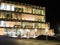 Modern residential buildings with glass balconies.