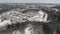 Modern Residential Urban Area Surrounded by Forest at Winter, Aerial