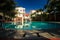 Modern Resort Hotel Houses Reflect in Pool Blue Water