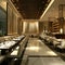 A modern restaurant interior exuding sophistication, inviting guests to savor exquisite dining
