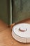 Modern robotic vacuum cleaner washing floor