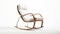 Modern Rocking Chair With White Leather Upholstery