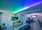 Modern room with bight led strips light. Tv, monitor and sofa