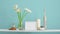 Modern room decoration with crate. Shelf against turquoise wall with decorative cactus, glass and rocks. Hand putting down calla i