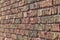 Modern rough textured colorful beige tone clay brick wall texture