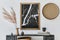 Modern scandinavian home interior with design wooden commode, mock up poster map, feather in vase, book and personal accessories