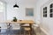 Modern scandinavian styled interior dining room with pendant ligh horizontal