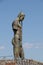 Modern sculpture warrior - Pompeii against a perfect blue sky