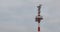 Modern sea radio tower Close-up on the background of the cloudy autumn sky