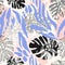 Modern seamless pattern with animal skin print and botanical tropical leaves