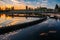 Modern sewage treatment plant. Round wastewater purification tanks at sunset