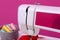 Modern sewing machine on color background,